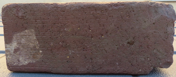 Unmarked face of the Denny Renton brick