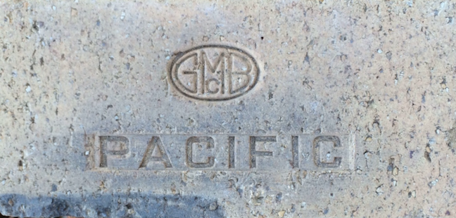 Marked face of the [GMcB oval logo] / PACIFIC brick