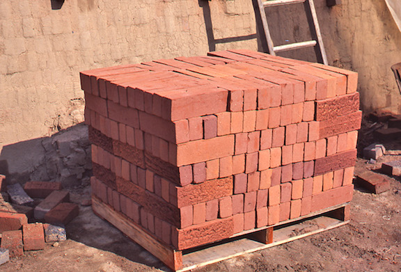 View of a pallet of fired brick. 
