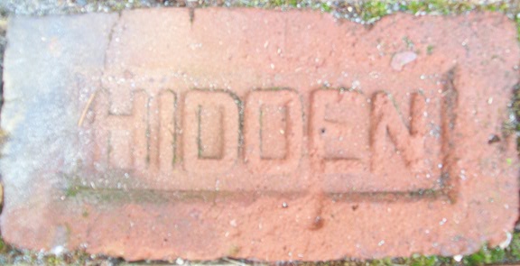 View of the marked face of the Hidden common brick.