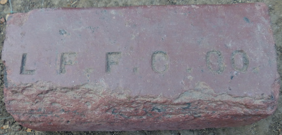 View of the marked face of the L.F.F.C.Co. paving brick.